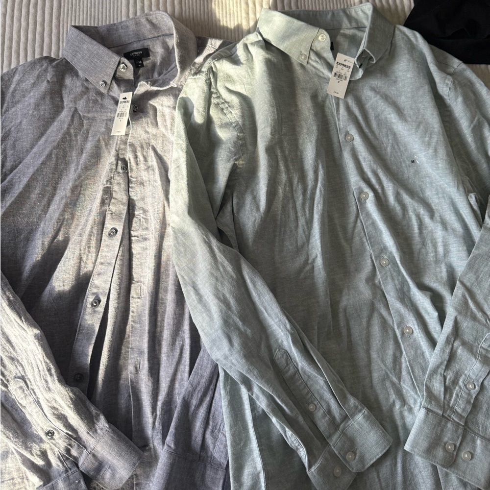 Two men’s size medium express dress shirts